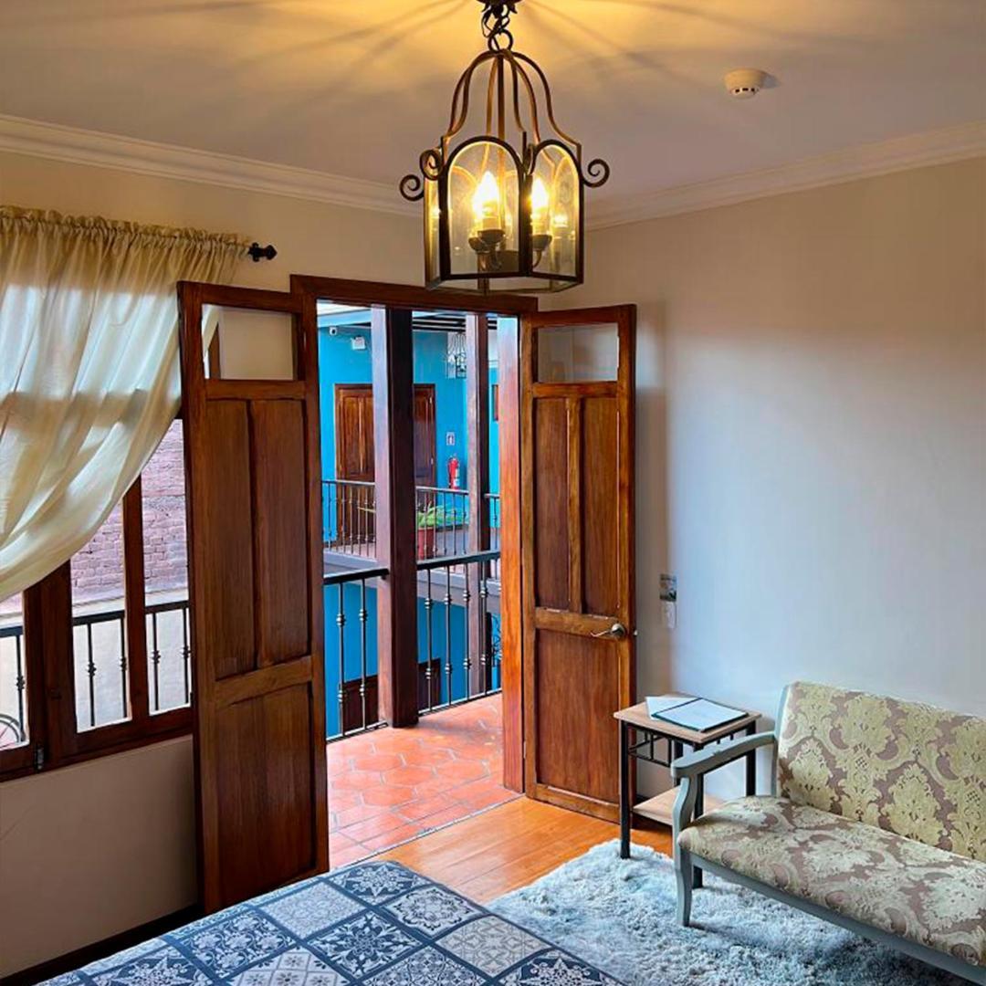 Casa Hibiscus Boutique Hotel Куенка Екстер'єр фото